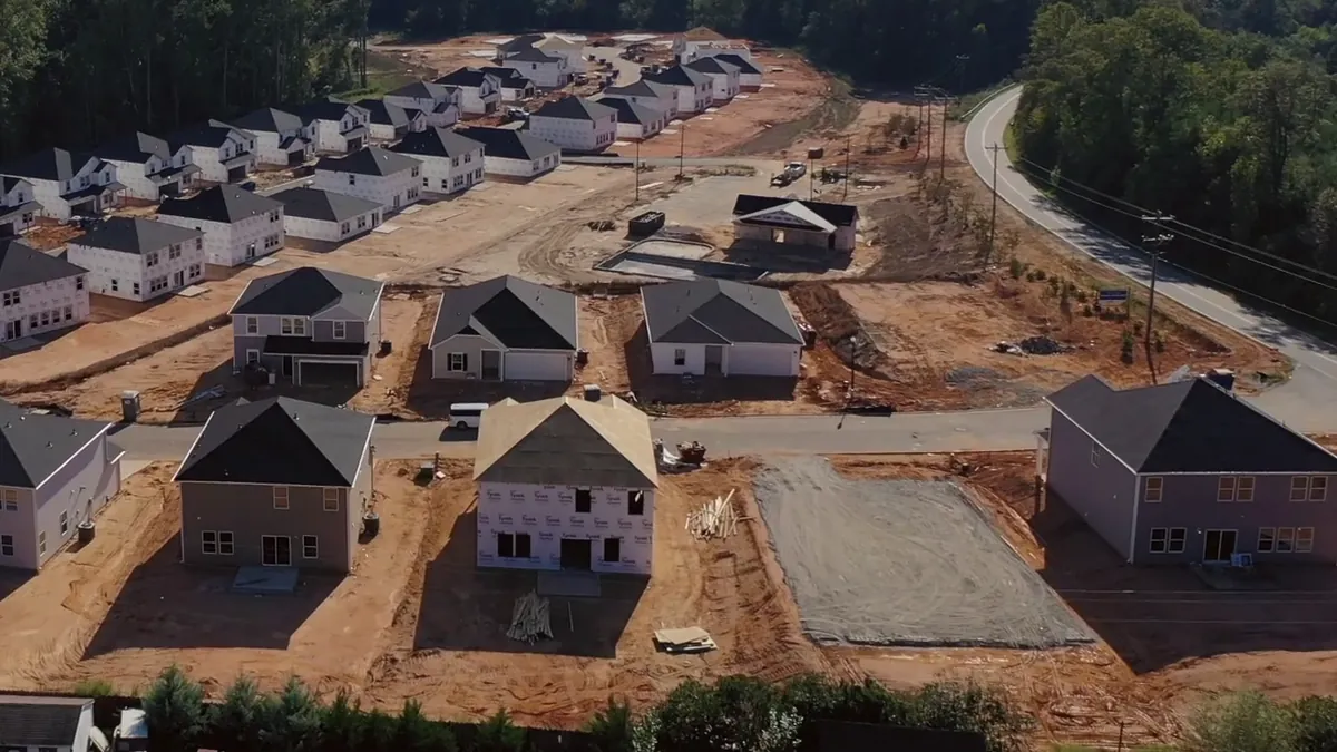 Graded lots beside a new road on a construction site