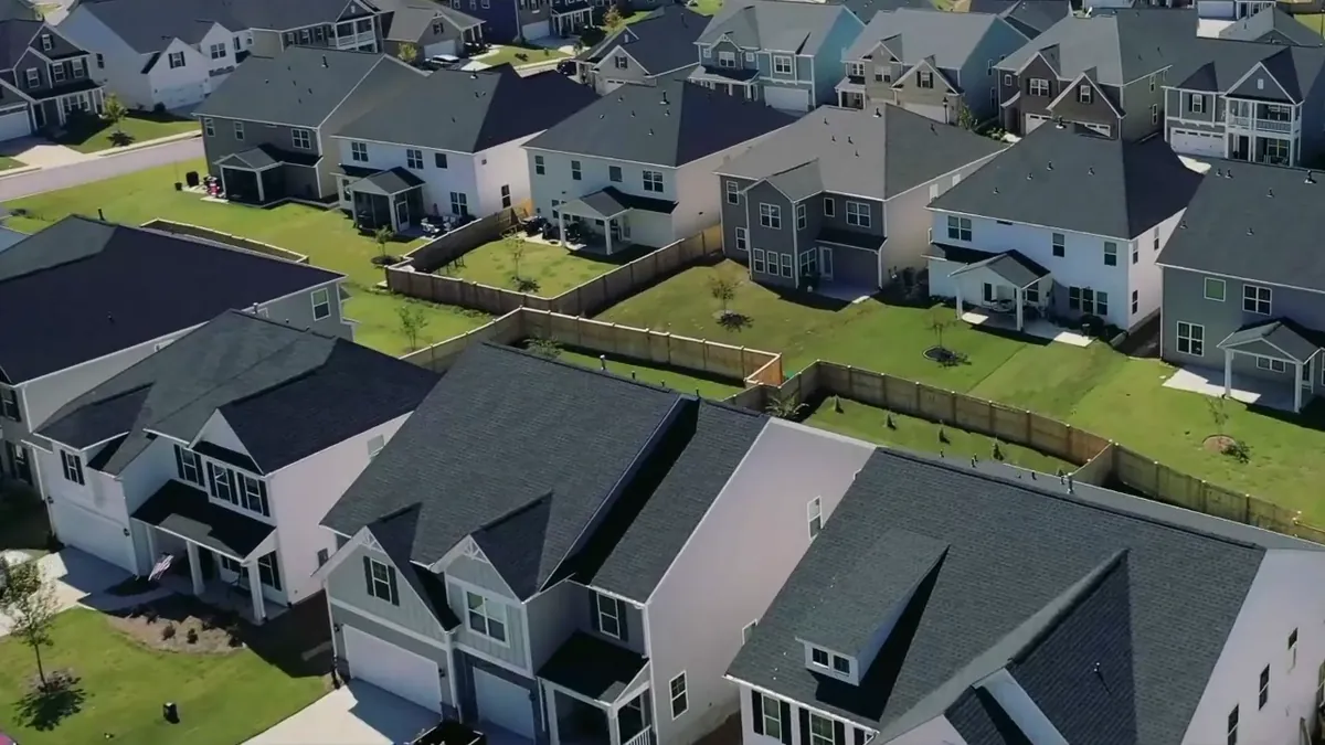 Rooftops of finished two-story homes from the air